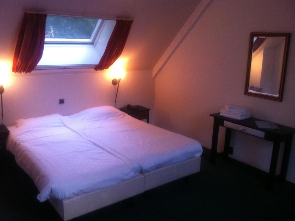 Aparthotel Tante Sien Vasse Pokoj fotografie